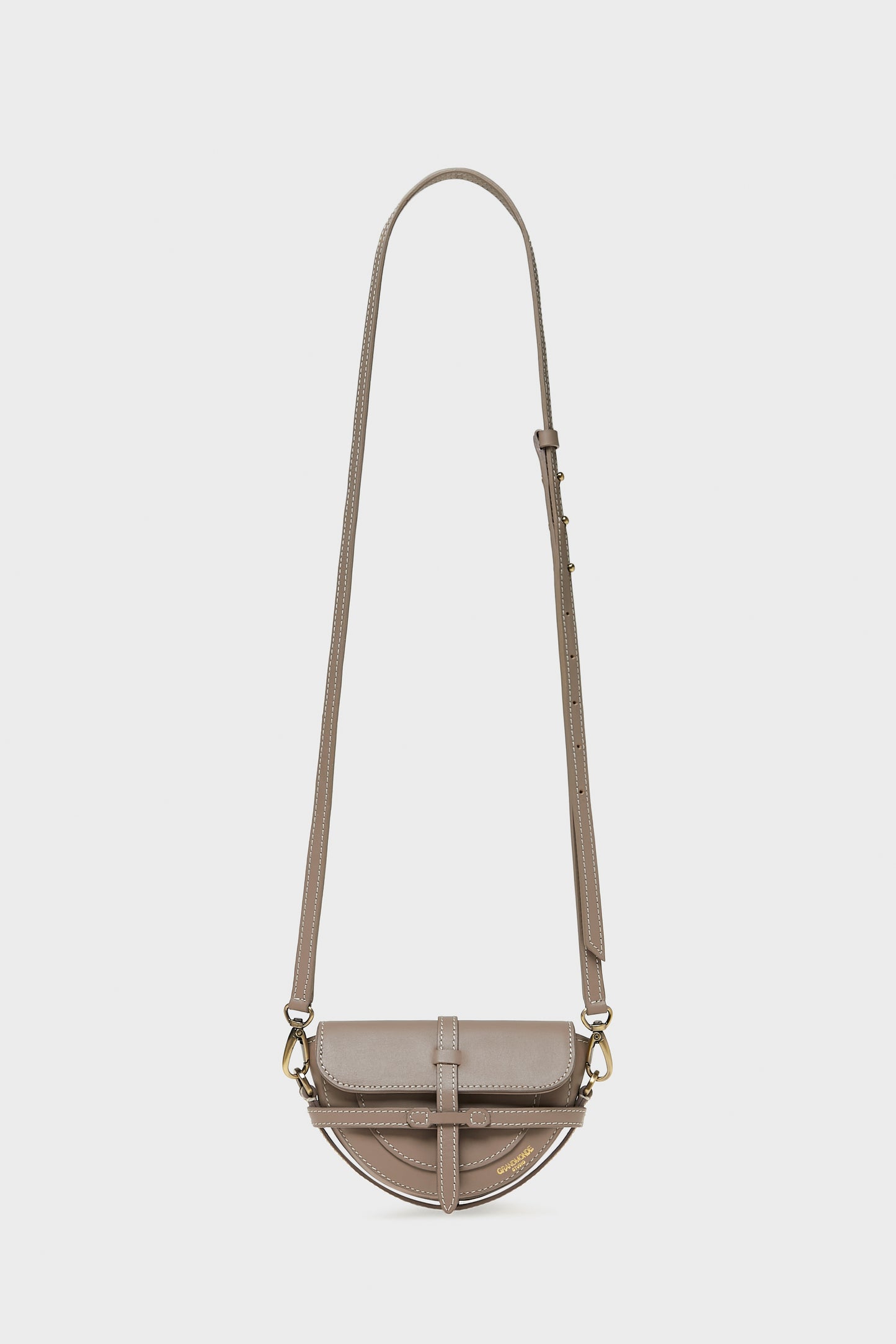 TAUPE SIMON MINI SADDLE BAG IN SMOOTH LEATHER